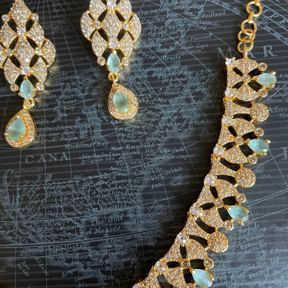 Elegant Gold-Tone Necklace & Drop Earring Set with Pale Green Gem Accents